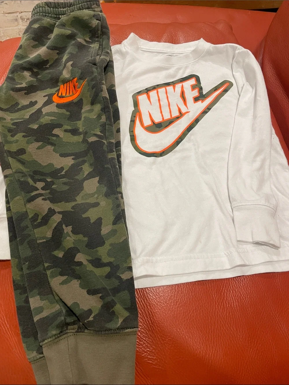 Nike Kids Camo Sweatpants with Orange Logo with matching long sleeve Nike shirt
